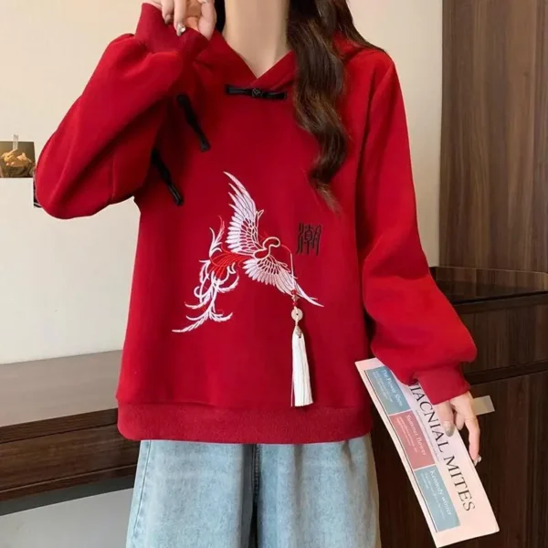 Chinese style phoenix embroidery pullover hoodie for women in red with black frog buttons and tassel detail
