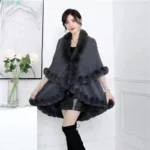 Beautiful Woman Wearing A Faux Fur Collar Cloak Coat In Grey