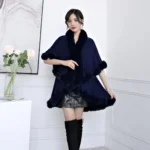 Beautiful Woman Wearing A Faux Fur Collar Cloak Coat In Navy Blue