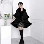 Beautiful Woman Wearing A Faux Fur Collar Cloak Coat In Black